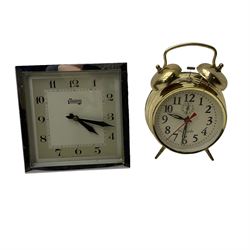 Spring wound mantle clock and twin bell alarm clock