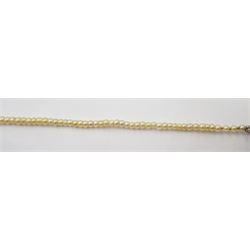 Three strand pearl necklace, with platinum diamond milgrain clasp and a single strand graduating pearl necklace with 18ct white gold clasp set with a diamond