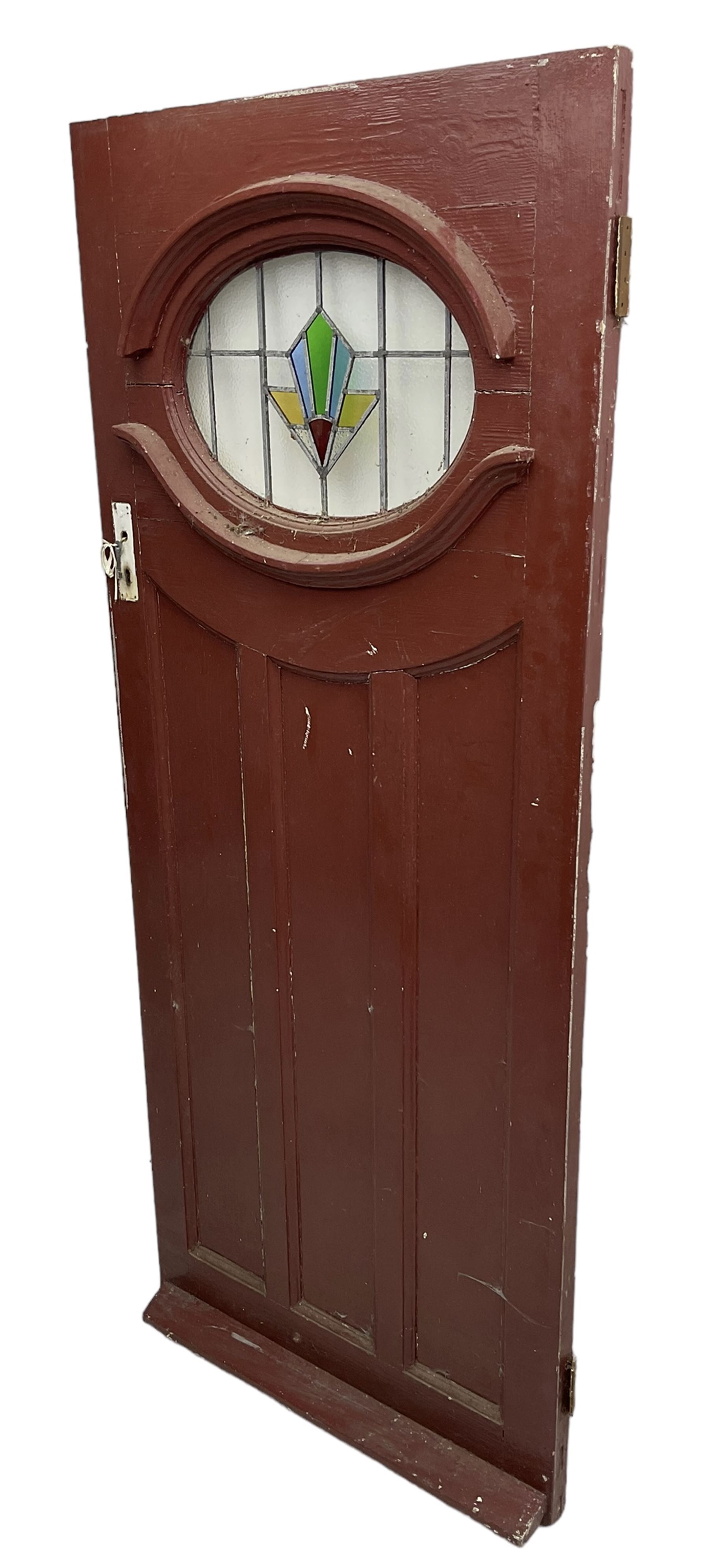 1930s external door with stained leaded glass panel (86cm x 203cm), six small stained glass windows in wooden frames (W52cm); and various loose stained leaded glass panels