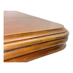 Victorian mahogany tilt-top table dining table, rounded tilt rectangular top with moulded edge, on octagonal column, raised on shaped quadriform base with bold scrolled feet