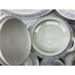 Royal Doulton tea and dinner wares in the Meadow Mist pattern, no H5007, comprising seven dinner plates, eight side plates, two lidded tureens, two jugs, lidded sucrier, oval serving dish, six teacups, seven saucers, seven tea plates and large saucer