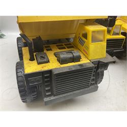 Tonka - five large scale pressed steel vehicles comprising Cement Mixer, Mobile Crane, Bulldozer and two Dumper Trucks (5)