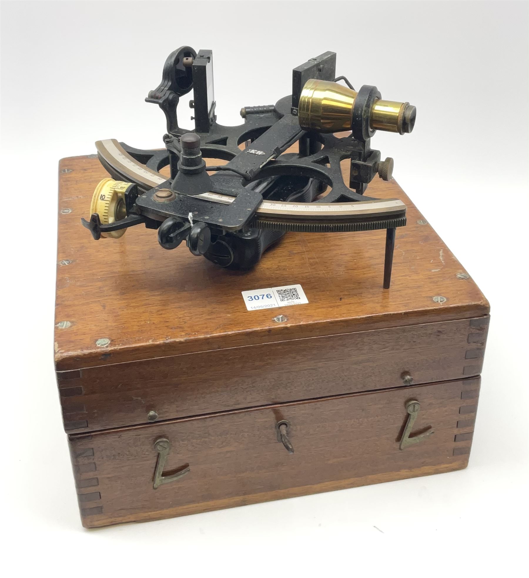 Henry Hughes & Son Ltd. sextant with black crackled finish, brass and silvered graduated arc and various coloured glass filters, serial no.60818, in fitted mahogany carrying box bearing Lilley & Reynolds Ltd. certificate dated 1962 W26cm