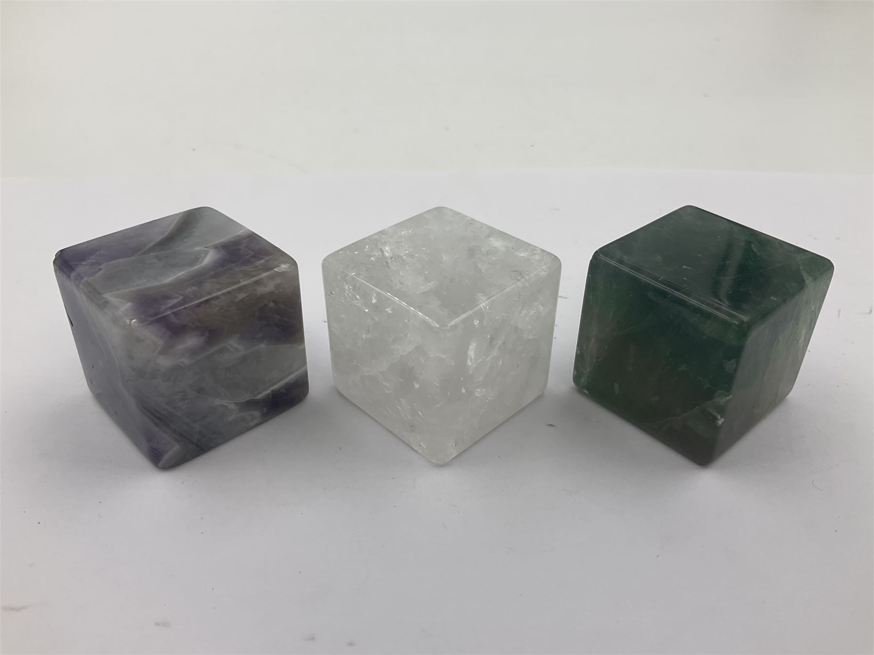 Ten cube mineral specimens, each cut and polished to highlight natural formations, including tiger eye, green aventurine, rose quartz, opalite, amethyst etc, H3cm 