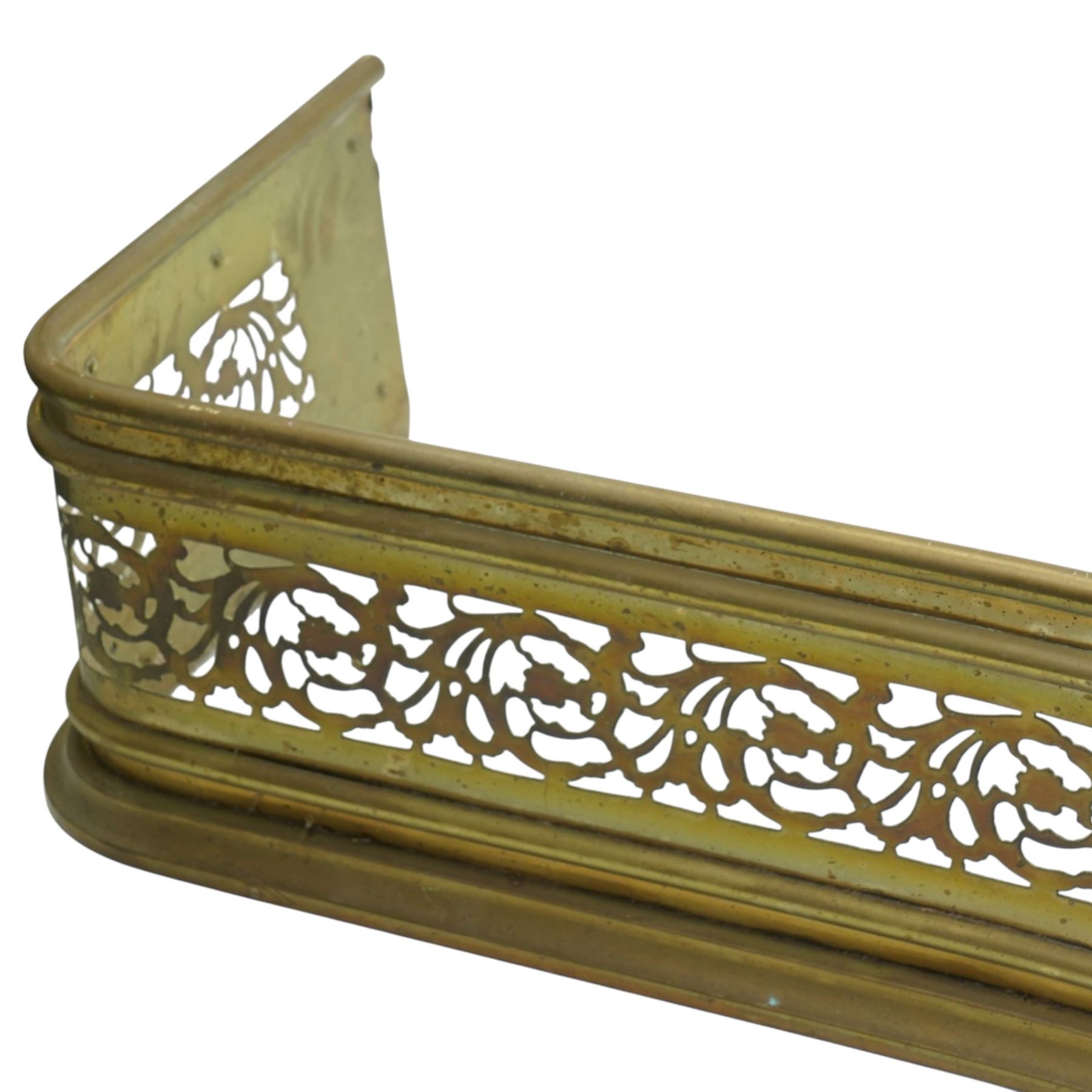 19th century brass fire curb of serpentine outline with pierced decoration W153cm