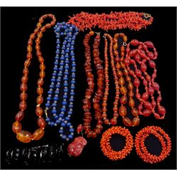 Amber and amber type bead necklaces, coral necklace and two coral wire bracelets, Whitby jet bracelet, agate necklaces etc