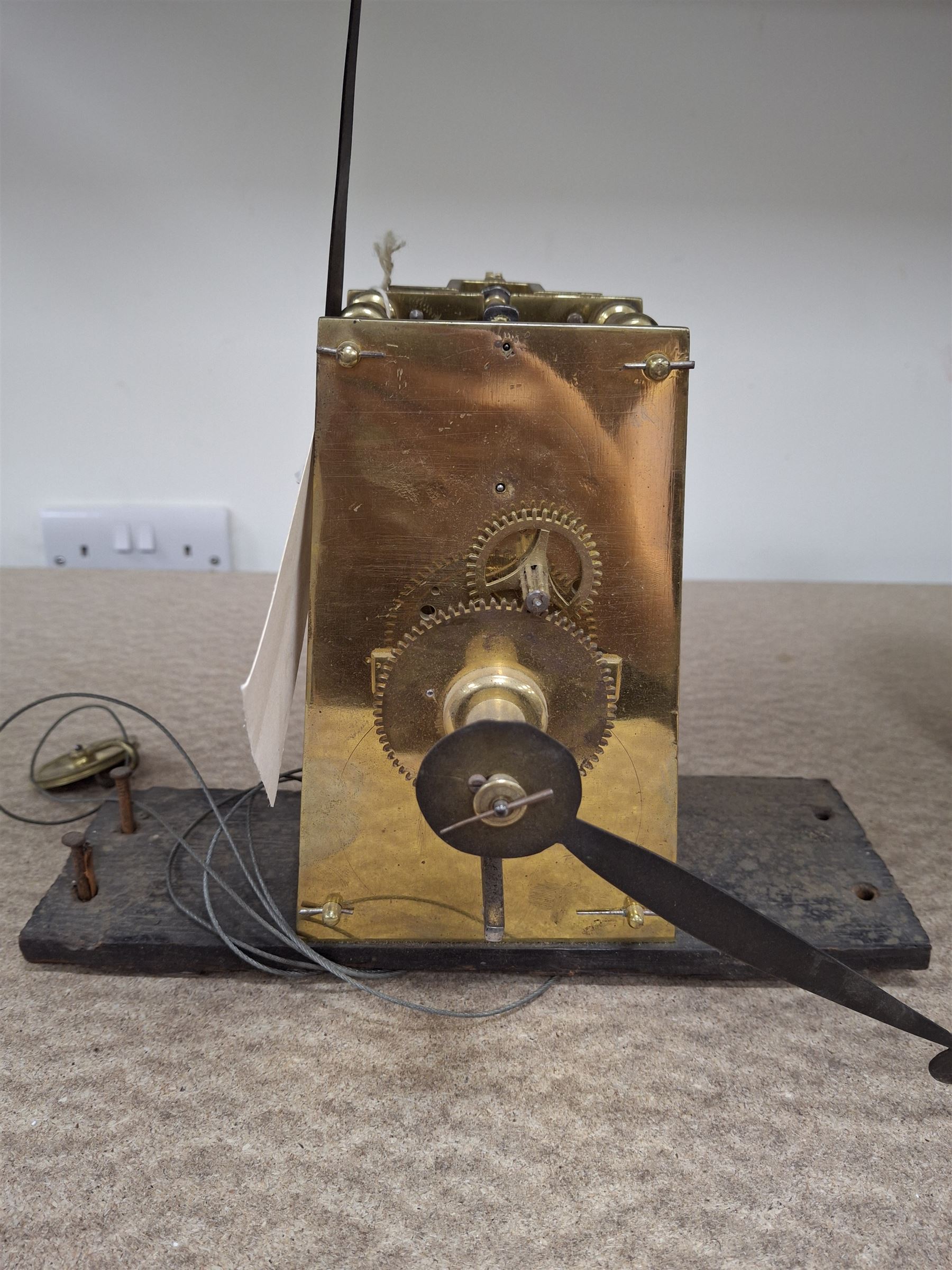 Two skeleton clock movements, tavern clock movement, and further clock movements, all for restoration 