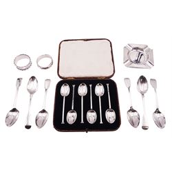 Group of silver, comprising set of six 1920's coffee spoons, hallmarked Cooper Brothers & Sons Ltd, Sheffield 1924, contained within a fitted case, small mid 20th century ashtray with engine turned decoration, hallmarked Mappin & Webb Ltd, Sheffield 1944, six George III Fiddle pattern teaspoons, various hallmarks, and two early 20th century napkin rings, approximate total silver weight 6.82 ozt (212.2 grams)