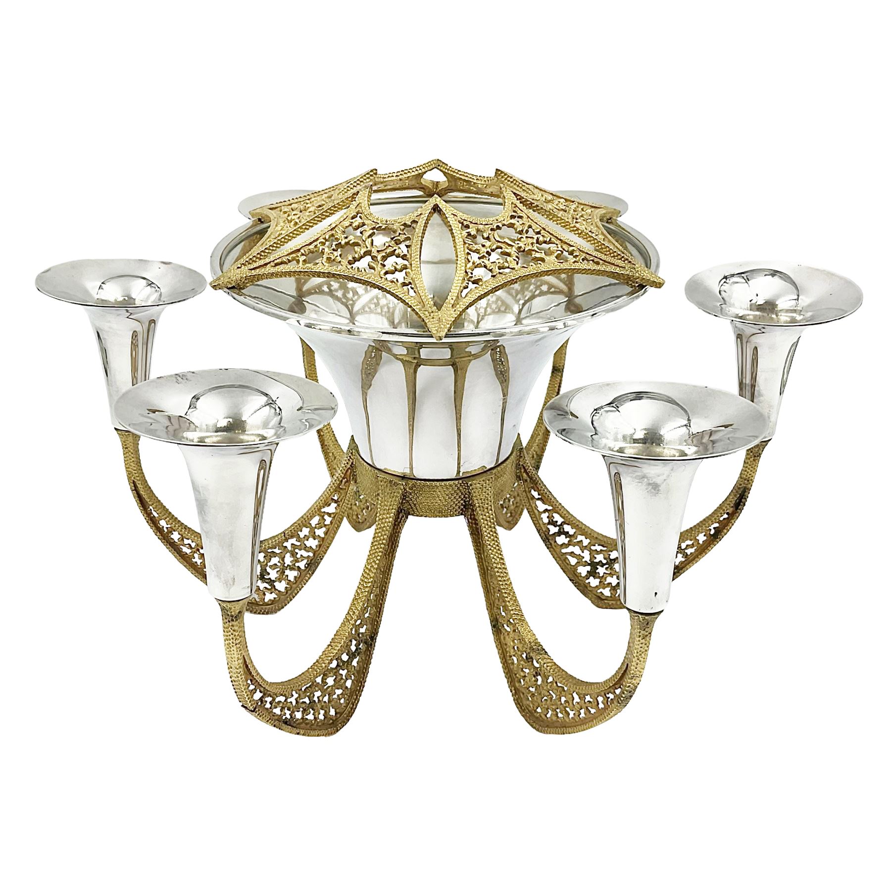 Modernist silver plated candelabra centrepiece by Stuart Devlin, with six pierced gilt branches supporting a central tapering cylindrical rose bowl and six fluted candle holders, with detachable star shaped gilt cover, stamped SD, TG to underside of central bowl, overall H17cm