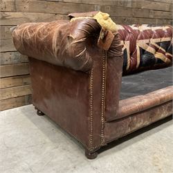 Chesterfield two sofa upholstered in brown leather, with Union Jack pattern, no seat cushions - located in storage, viewing not available