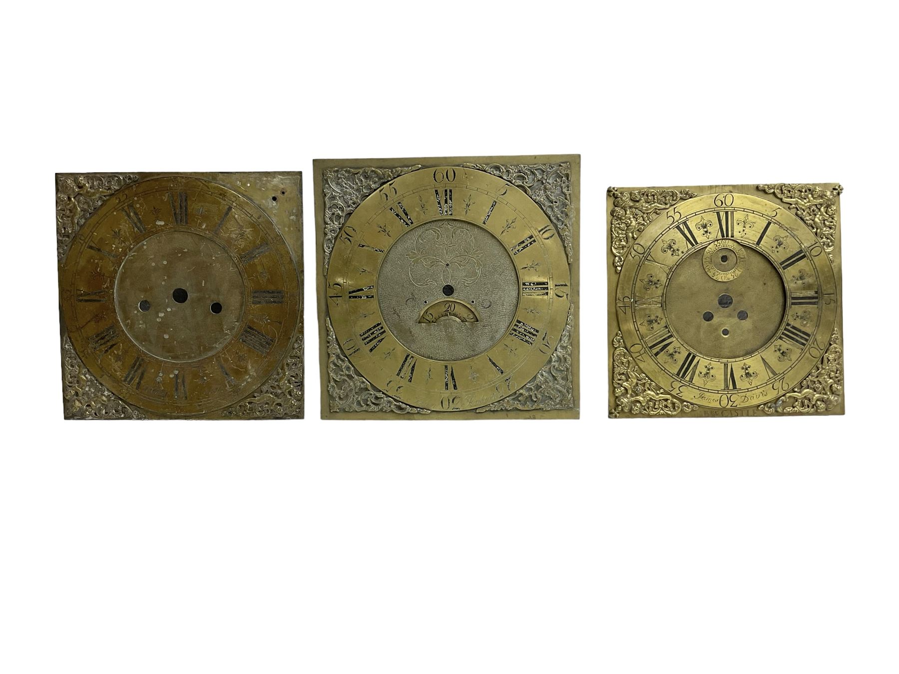 Four 13” painted 19th-century break arch longcase clock dials with one circular 12” American wall clock dial, plus two 11” and one 10” 18th-century brass longcase dials.