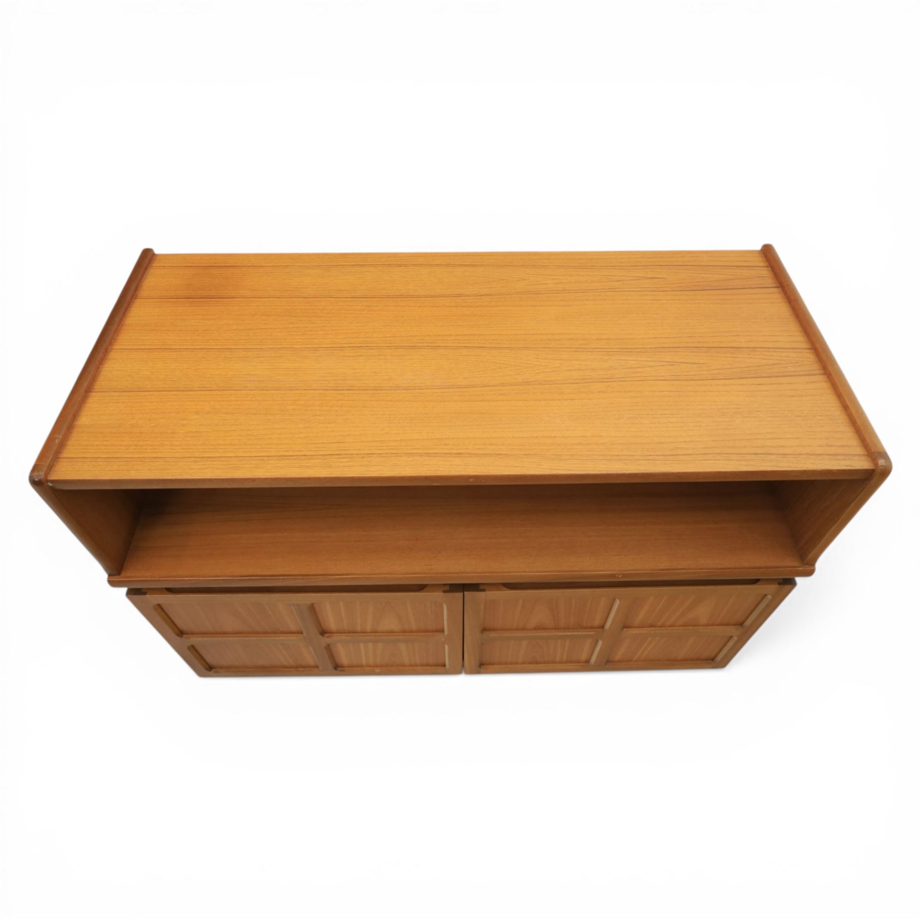 Nathan - teak sideboard and lamp table, both with signature square panelling, raised on a recessed plinth base (Lamp table H 51cm, D 46cm, W 52cm)