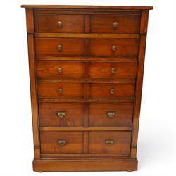 And So To Bed - cherrywood tall chest of six drawers, rectangular top over six long drawers, brass knobs and brass pulls with label holders, raised on a plinth base