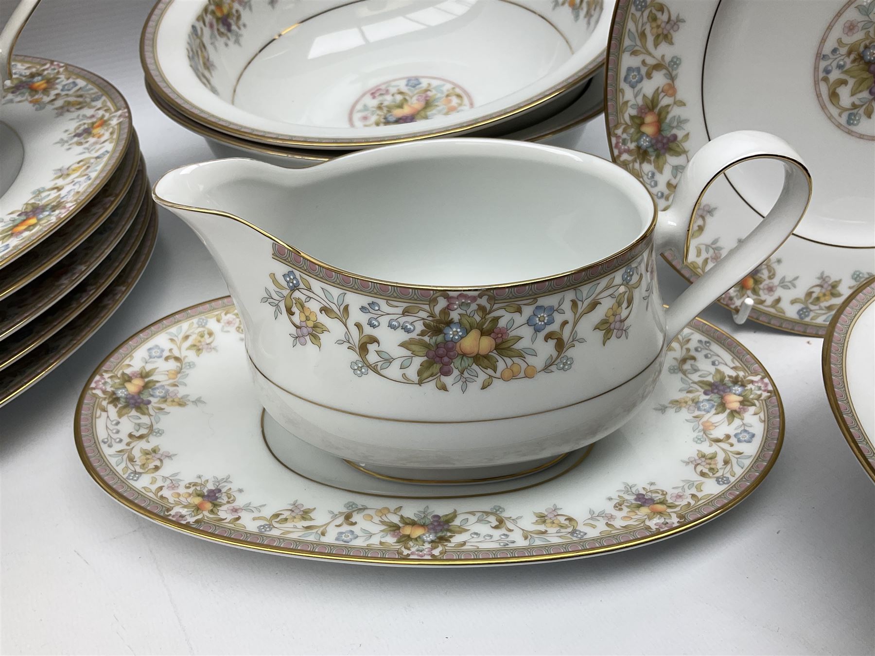 Noritake Ireland tea and dinner wears, comprising of teapot, milk jug, covered sucrier, seven teacups and saucers, seven dessert plates, six dinner plates, seven side plates, five bowls two serving dishes, one lidded tureen and a gravy boat and dish