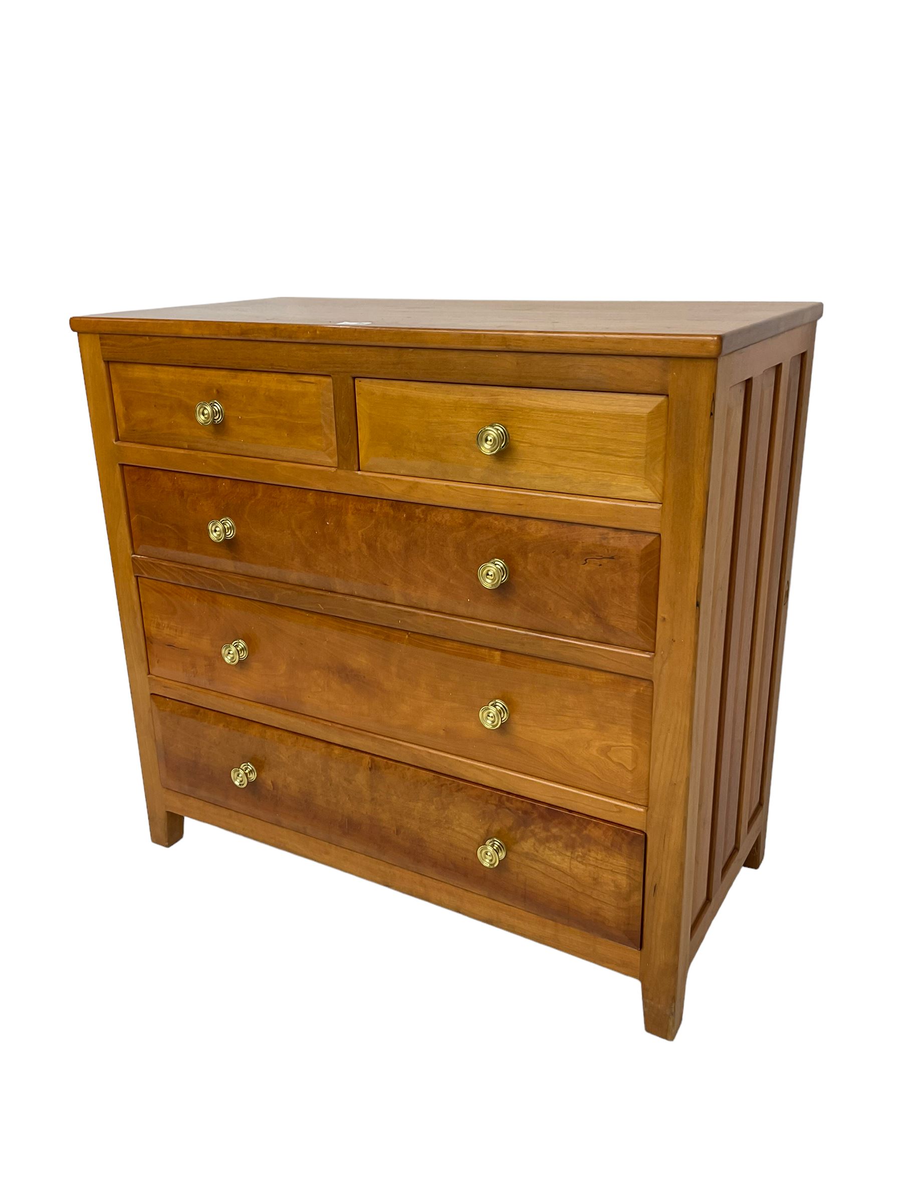 Knightman - cherrywood chest, fitted with two short and three long drawers, with panelled sides on square feet by Horace Knight workshop of Balk, Thirsk