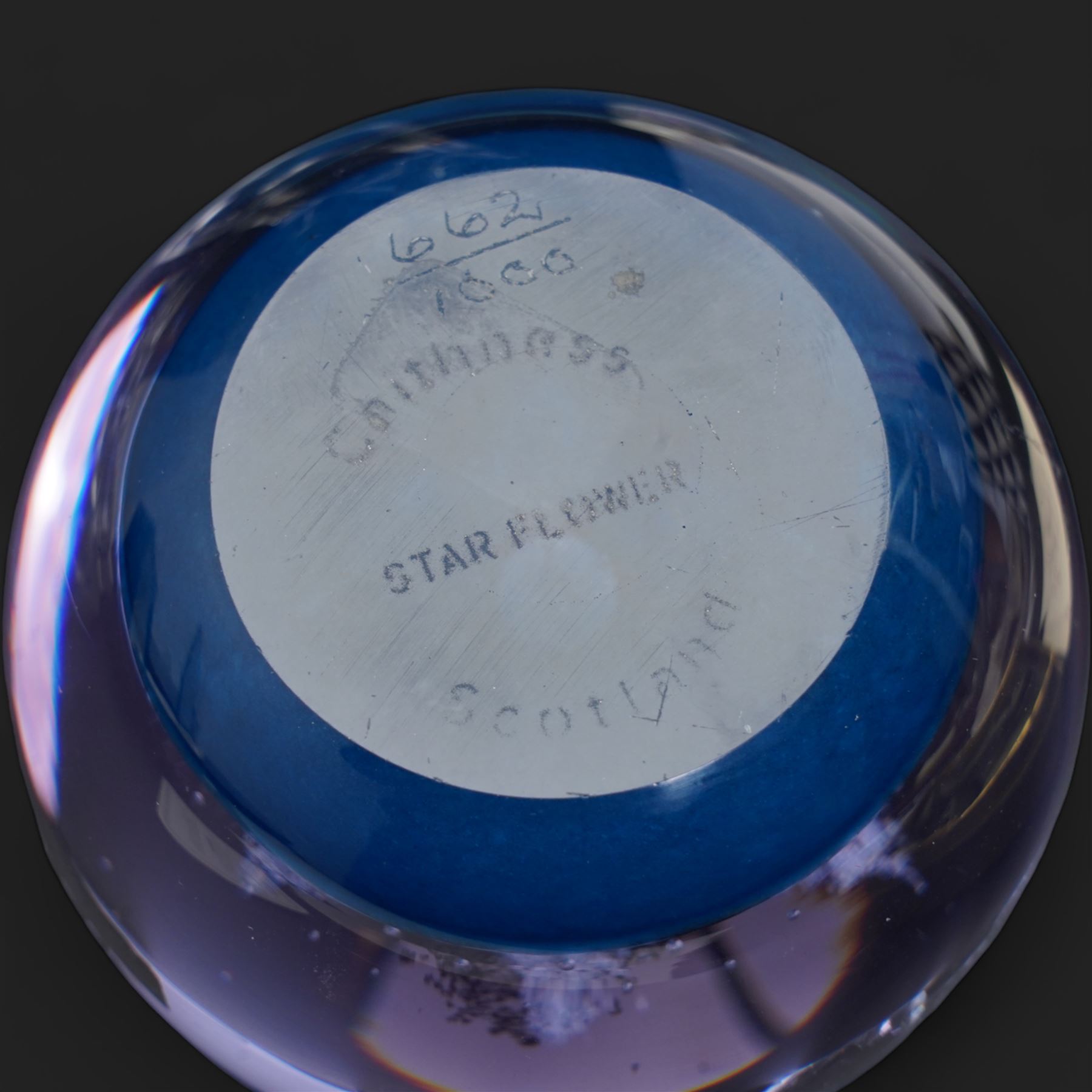 David Wallace iridescent glass vase, H14cm, French Sevres glass vase, Caithness 'Star Flower' paperweight, Crummles enamel label holder and a Stuart crystal ashtray (5)