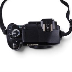 Olympus Evolt E-330 camera body, serial no. B88501541, with original Olympus Zuiko Digital 14-45mm 1:3.5-5.6, boxed with instructions, with three additional boxed Olympus Zuiko Digital lenses 70-300mm f4.0-5.6, 40-150mm f3.5-4.5 and 14-54mm f2.8-3.5, all boxed