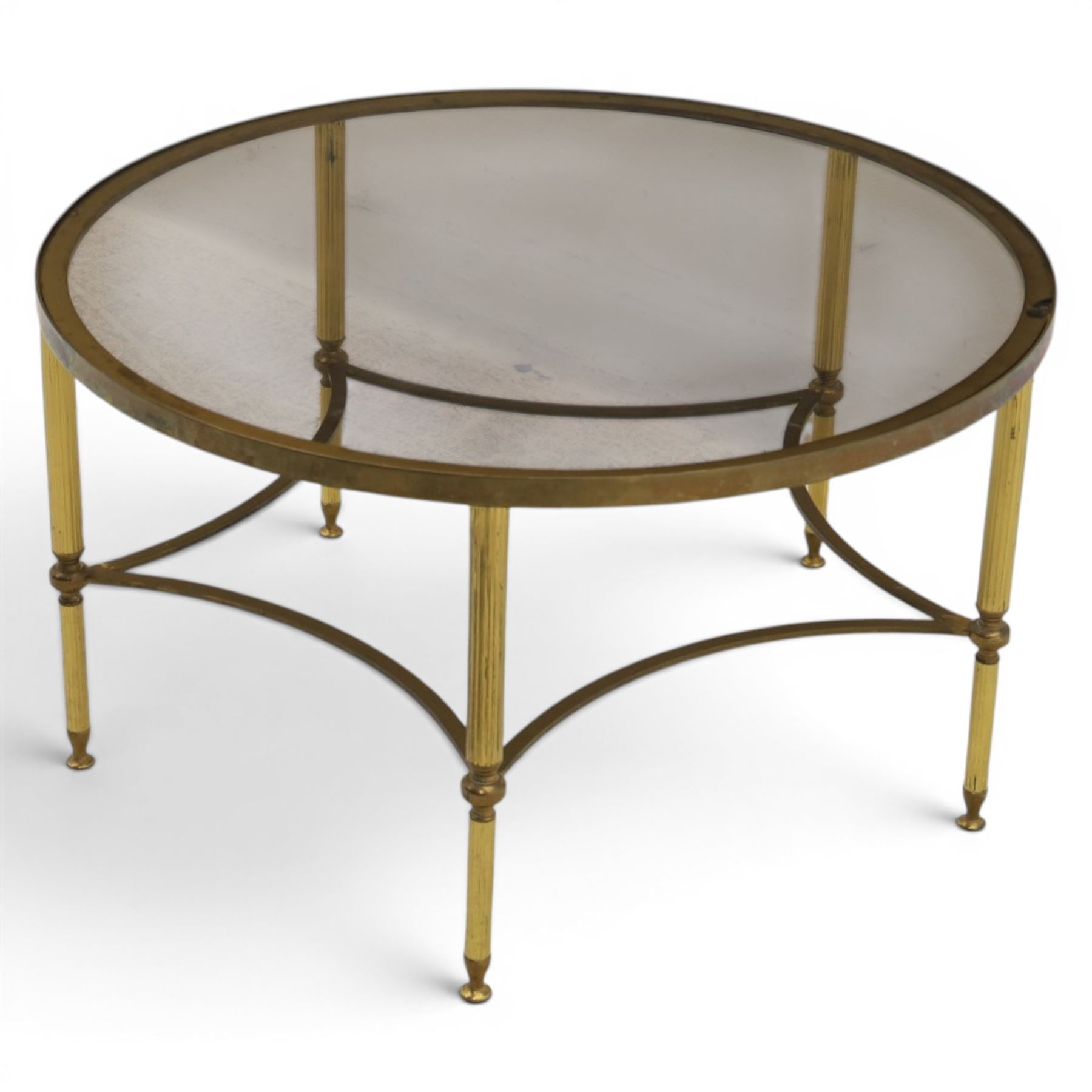 Regency style brass and glass circular table, smoked glass top mounted to a brass frame with fluted supports united by stretchers