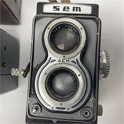Franke & Heidecke Rolleicord twin lens camera, serial number 012706 with Heidoscop-Anastigmat f=7.5cm' lens and a 'Carl Zeiss Jena Triotar 1:4.5 f=7.5cm' lens, serial no 1474898, together with three similar cameras, including SEM TLR, serial no 420218, Ising Pucky box and Ferrania Elioflex, three in leather carry cases