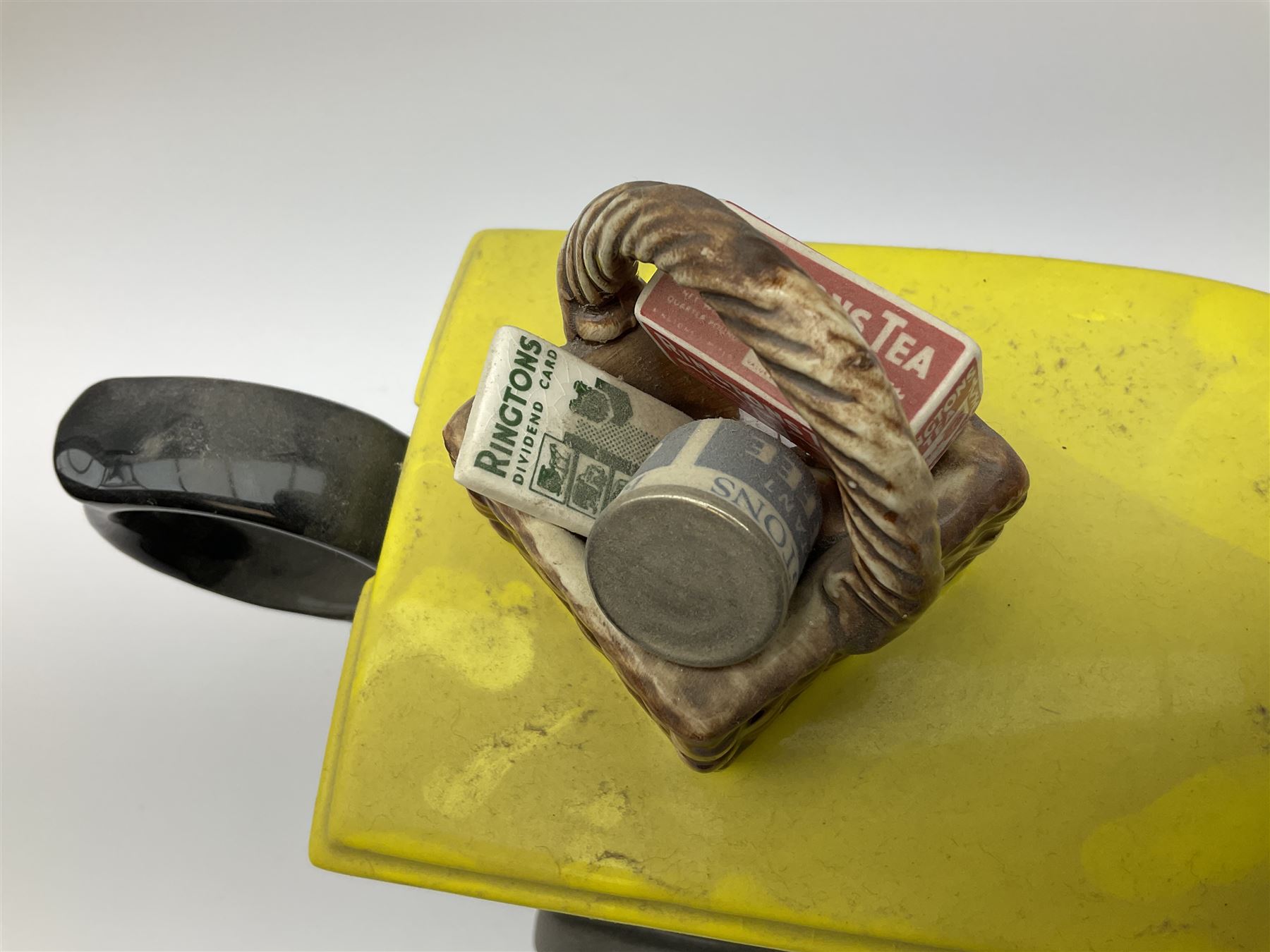 Three Ringtons novelty teapots, comprising The Ringtons Van teapot, the Tea Merchant teapot, and Millenium Celebration teapot. 