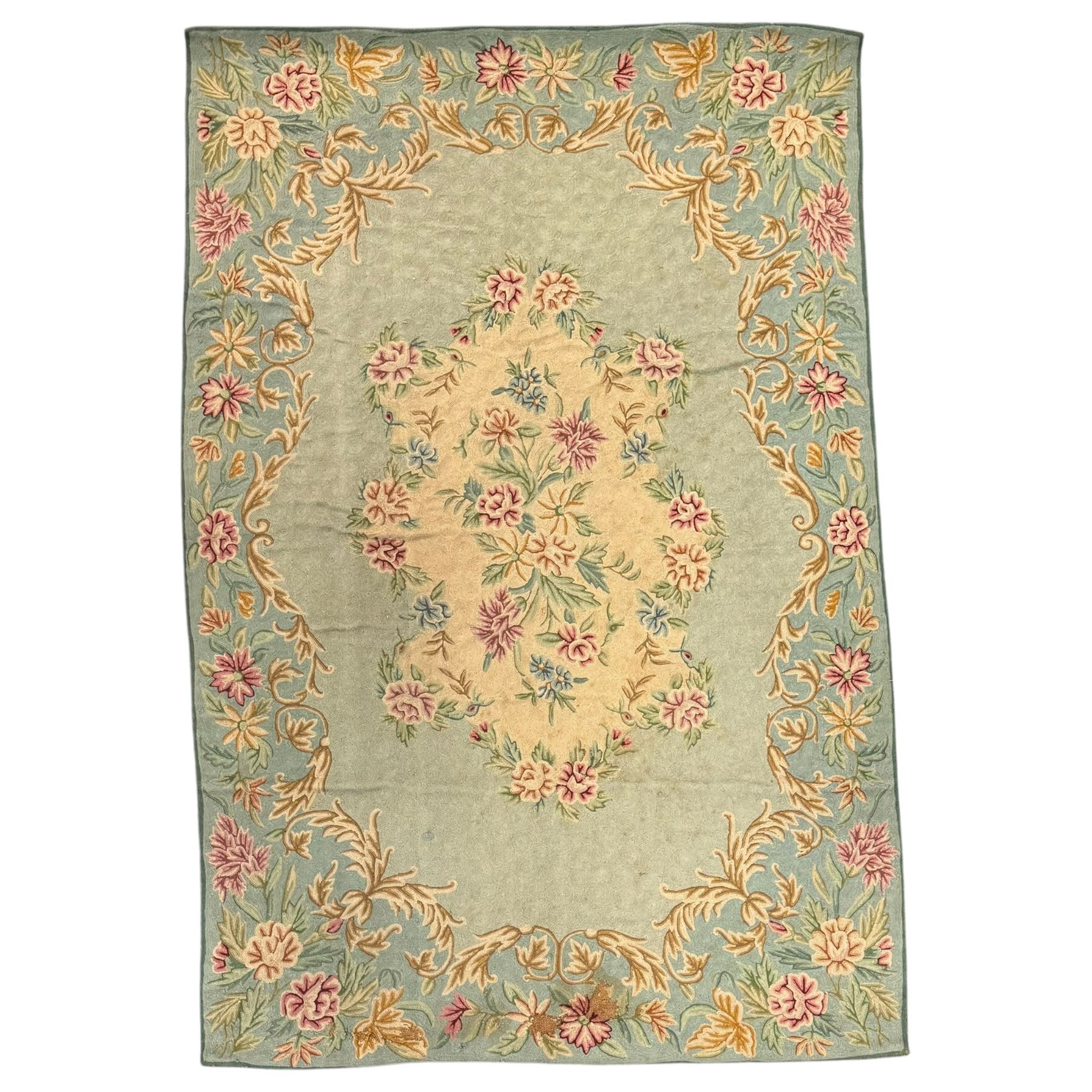 Two early 20th century Kashmiri cyan ground crewelworks 