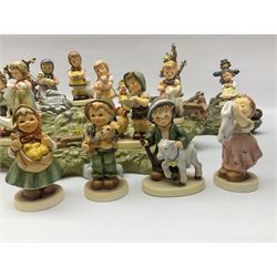Collection Hummel figures by Goebel, together with three hummel landscapes, Hummel Quelle, Hummel Weiher and Hummel Garten