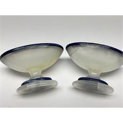 Pair of lapis lazuli and agate open salts, of navette form, upon a stepped oval pedestal foot, H5cm, L8cm