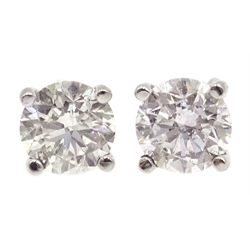  18ct white gold single stone diamond stud earrings, stamped 750, diamonds approx 1 carat  