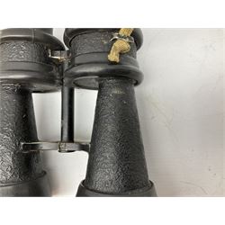 Pair of WWII German U-boat binoculars probably 7 x 50 by Leitz, with rubber eye piece protector covers and leather case stamped with Kriegsmarine mark to the lid and dated 1944, with leather strap.