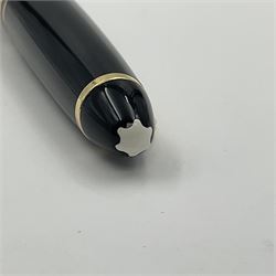 Montblanc Meisterstuck No. 146 fountain pen, the black plastic barrel and cap with gilt clip and banding, and 14ct gold nib marked 4810 14C, L14cm
