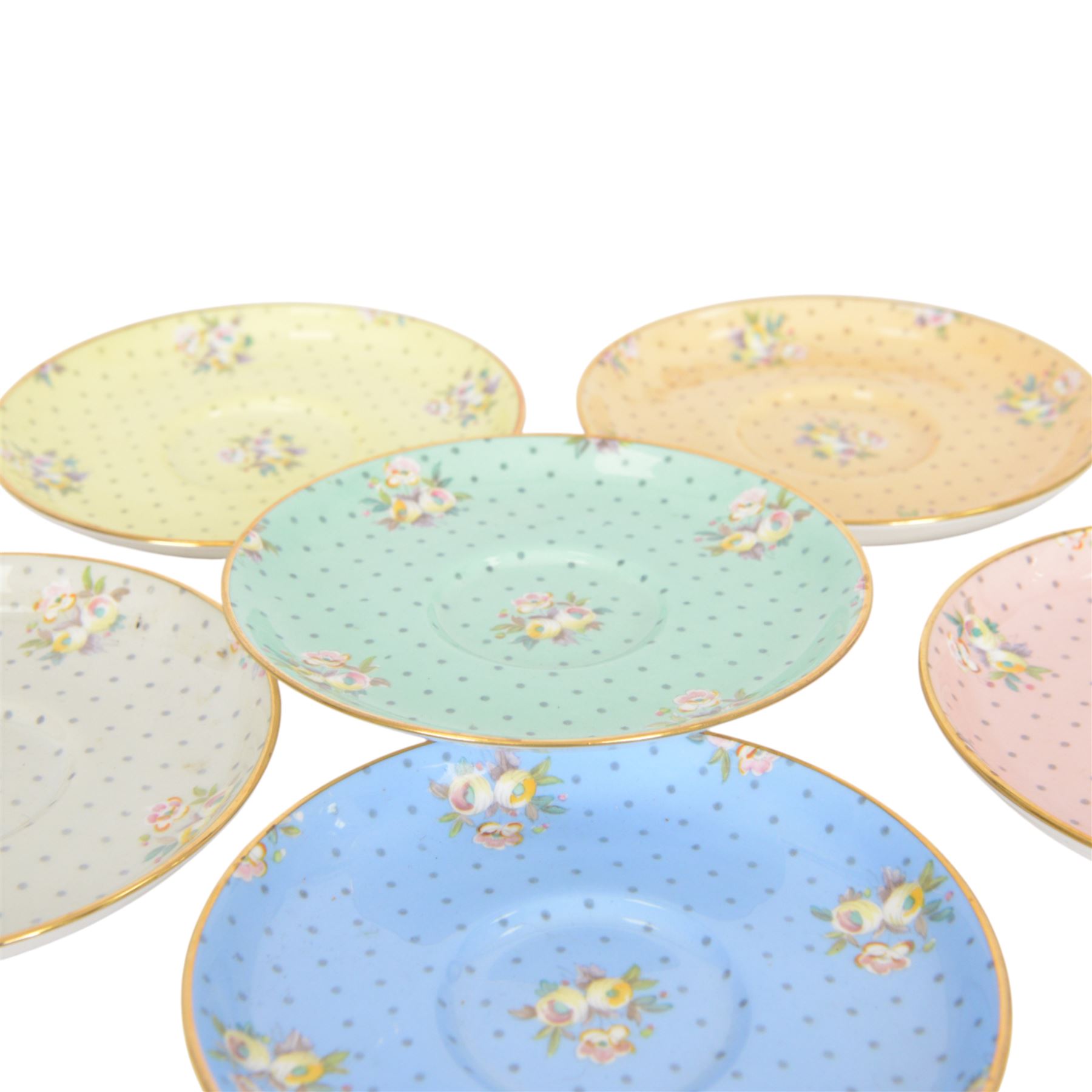 Spode six coffee cups and saucers cased set, decorated with floral sprigs on a polka dot ground with gilt detail
