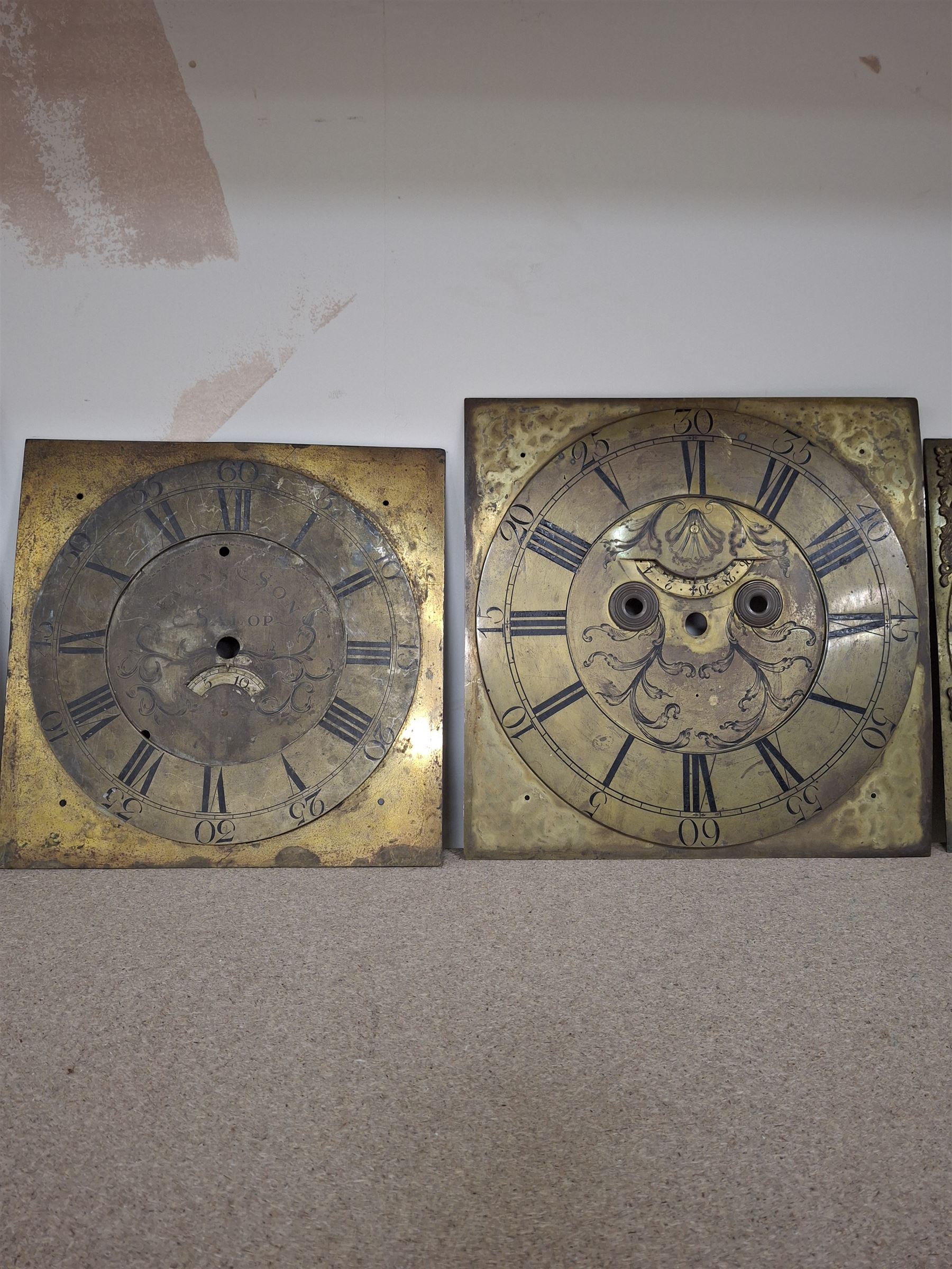 Approximately twenty-two longcase and wall clock dials, 18th century and later, included painted and brass examples