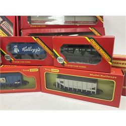 Hornby/Tri-Ang ‘00’ gauge - fifteen goods wagons to include freightliners with containers, ore wagons, closed vans etc; together with R404 Operating ore wagon set; all boxed (16) 