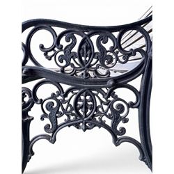 Victorian Andrew McLaren pattern cast iron bench, the ornate ends with detailed scrollwork, joined together with a cast iron seat and backrest frame supporting gently weathered oak slats, Victorian diamond stamp mark