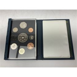 Ten The Royal Mint United Kingdom proof coin collections, dated 1983, 1984, 1985, 1986, 1987, 1992, 1994, two 1997 and 1998 all in blue folders with certificates