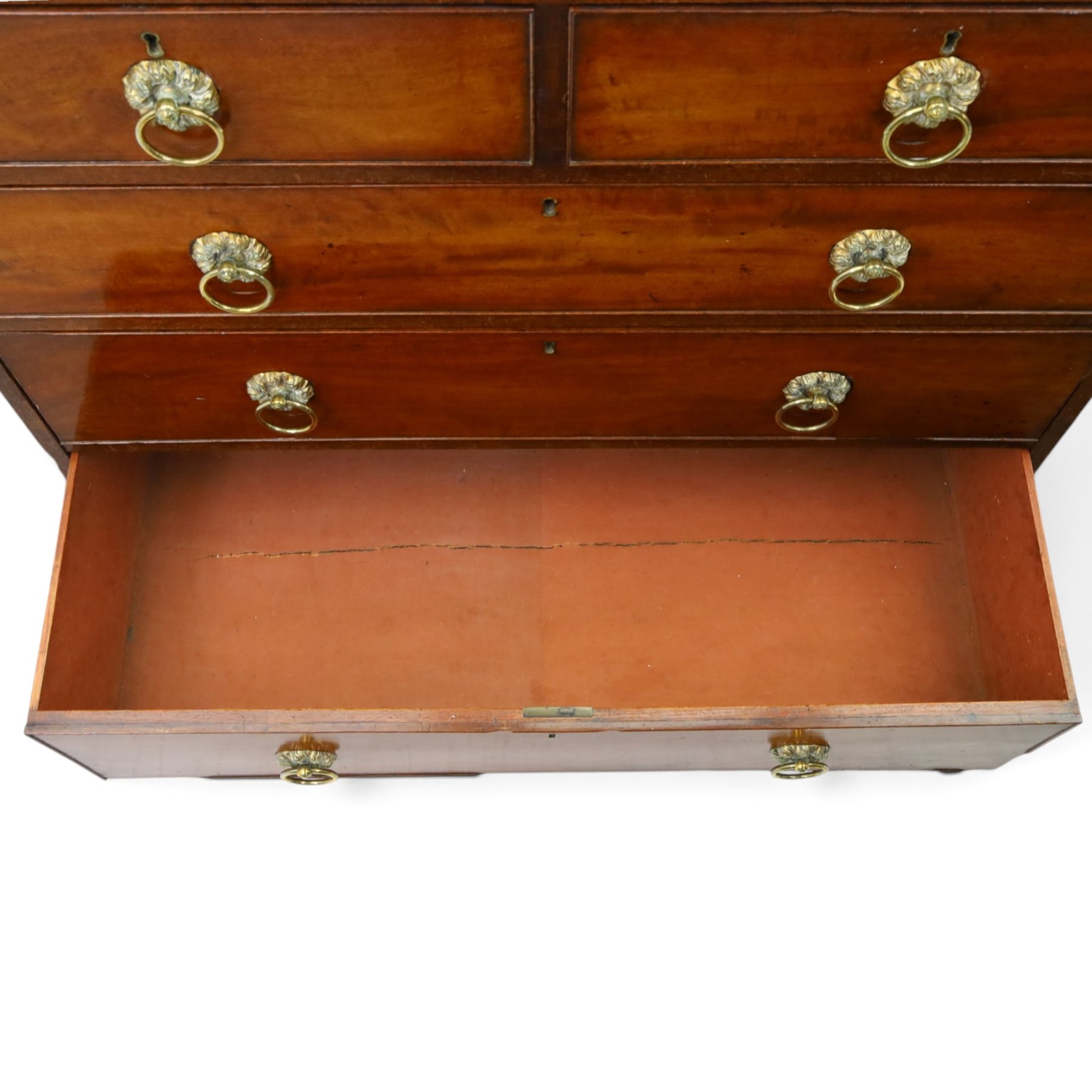 George III mahogany straight-front chest, two short over three long graduating drawers, cockbeaded edges with brass rose handles, raised on shaped supports
