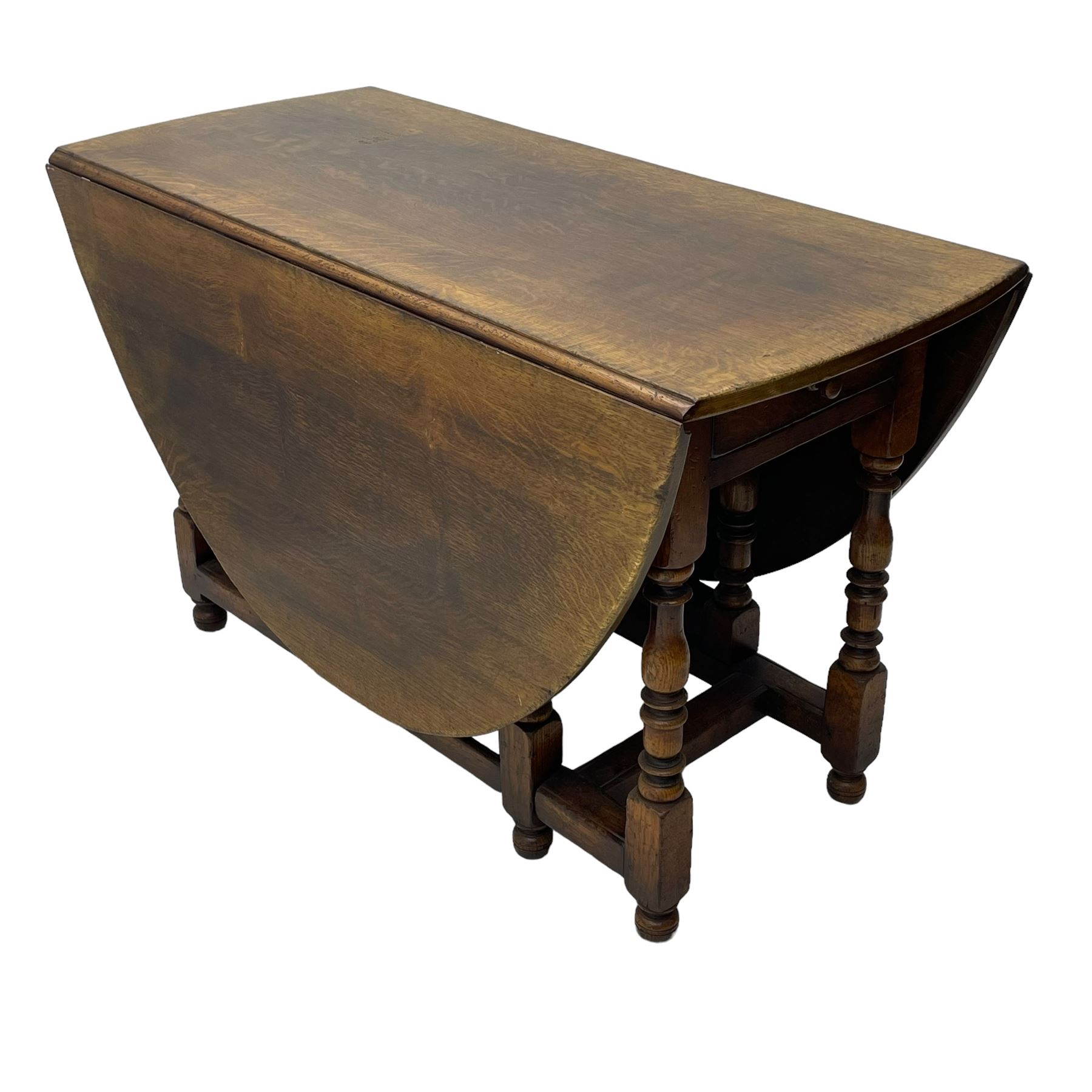 19th century oak dining table, oval drop-leaf top on gate-leg action base, turned supports united by turned stretchers, fitted with single end drawer