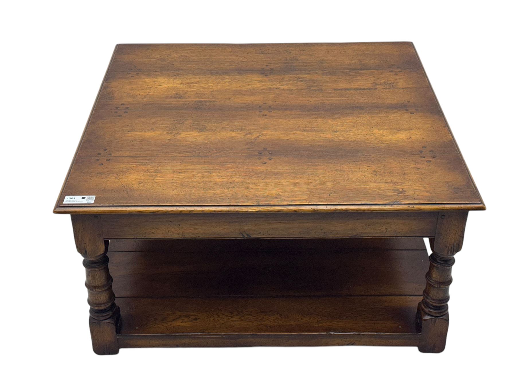 Oak coffee table, square moulded top on turned supports united by undertier 