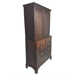 George III oak linen press, projecting cornice with dentil moulding over two panelled doors enclosing two adjustable shelves, fitted with two short over three long drawers, raised on bracket feet