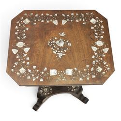 Victorian mahogany and mother-of-pearl inlaid work table, the octagonal hinged top enclosing a mirror and fitted compartmented interior, raised on a carved pedestal and quatriform platform base with scrolled feet
