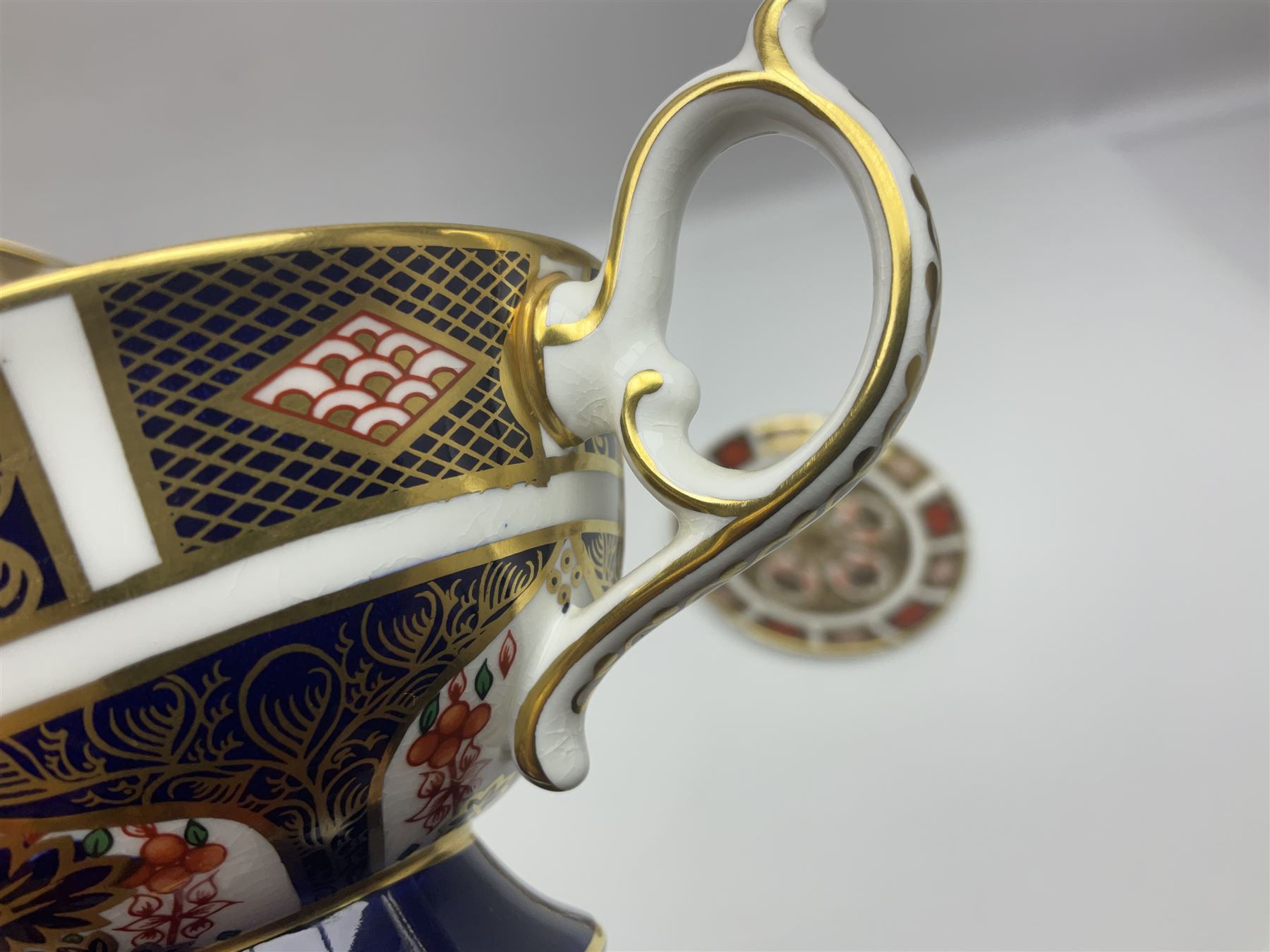 Royal Crown Derby Old Imari pattern miniature vase, coffee can and saucer, teacup and saucer and plate, all with printed mark beneath, vase H8cm 