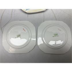 Shelley Dainty pattern tea wares, of lobed form with blue star decoration on merging white and yellow ground, comprising five teacups, five saucers, six tea plates, milk jug and cake plate, all with printed green mark beneath, some with painted pattern no 11770