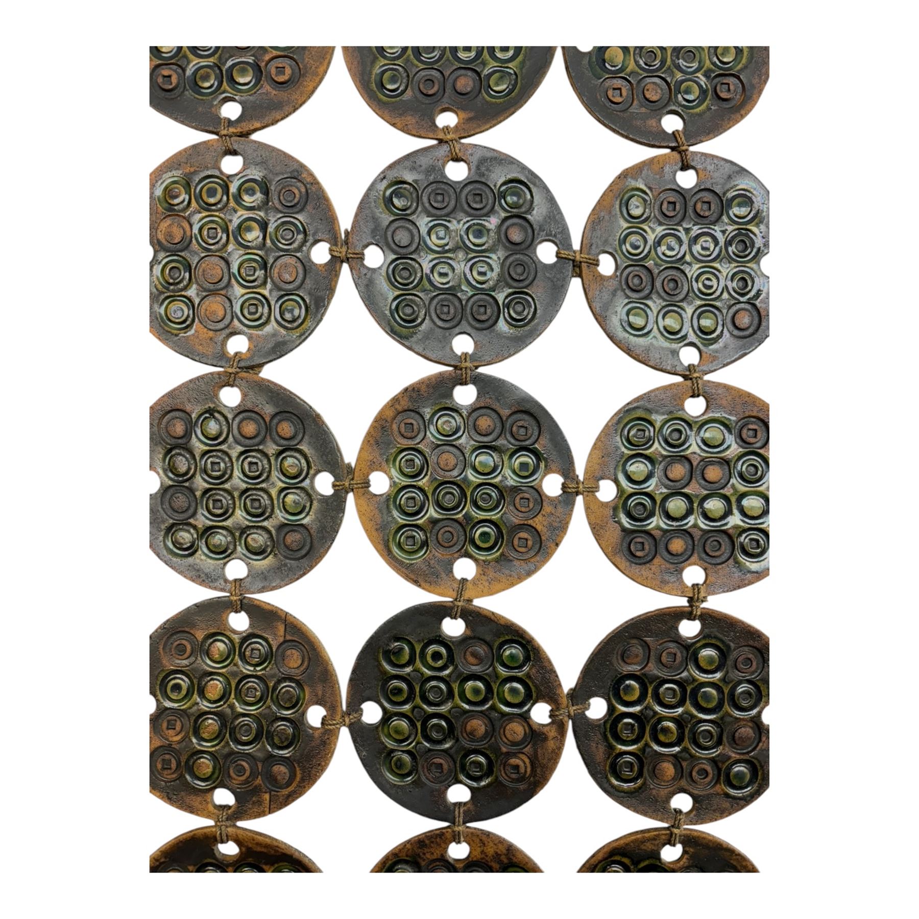 Attributed to Hornsea Pottery wall, hanging, with geometric circles attached to a wooden beam