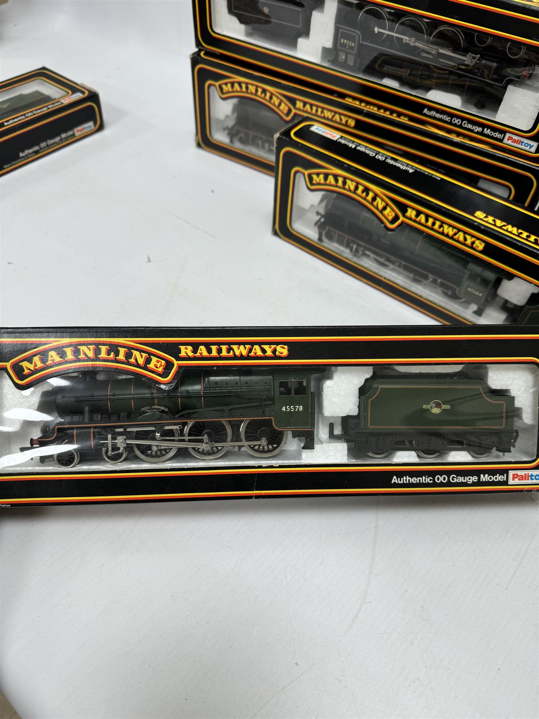 Seven Mainline Railways '00' gauge Jubilee Class 4-6-0 locomotives, comprising five 37062 in BR green livery, reworked as United Province no. 45578, Newfoundland no. 45573, Bellerophon no.45694, Nelson no. 45664 and no. 45691, 37047 Mars locomotive no. 45698 with Fowler tender in BR green livery and 936153 Western Australia locomotive no. 45568 in BR black livery, all boxed
