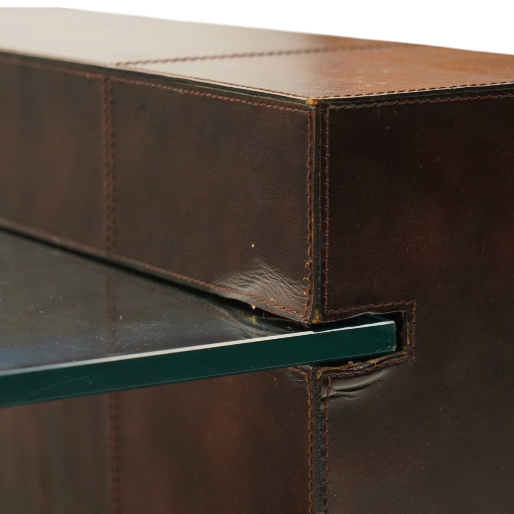 ML DS - Contemporary two-tier coffee table, brown leather-covered frame supporting a rectangular glass top and matching undertier
