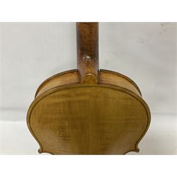 Copy of a full size Stradivarius violin, with an ebonised fretboard, tailpiece and tuning pegs, with a polished chin rest  Length 60cm