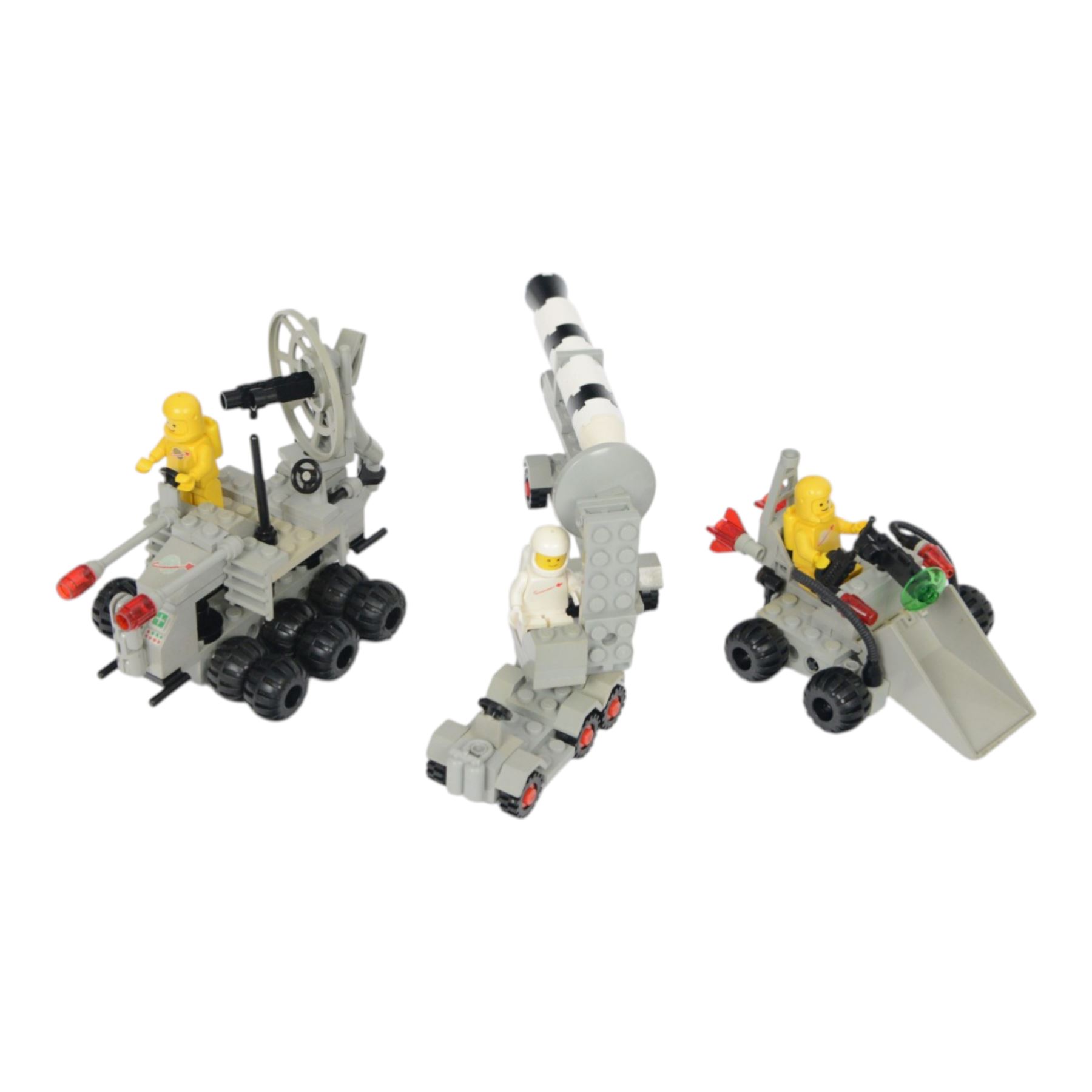 Eleven vintage Lego spaceships, comprising no. 6842 Shuttle Craft, no. 6879 Blizzard Baron, no. 6877 Vector Detector, no. 6880 Surface Explorer, no. 6852 Sonar Security, no. 897-1 Mobile Rocket Launcher, no. 6847 Space Dozer, no. 6834 Celestial Sled, no. 6846 Tri-Star Voyager, no. 6829 Radon Rover and no. 6815 Hovertron, all built with minifigures