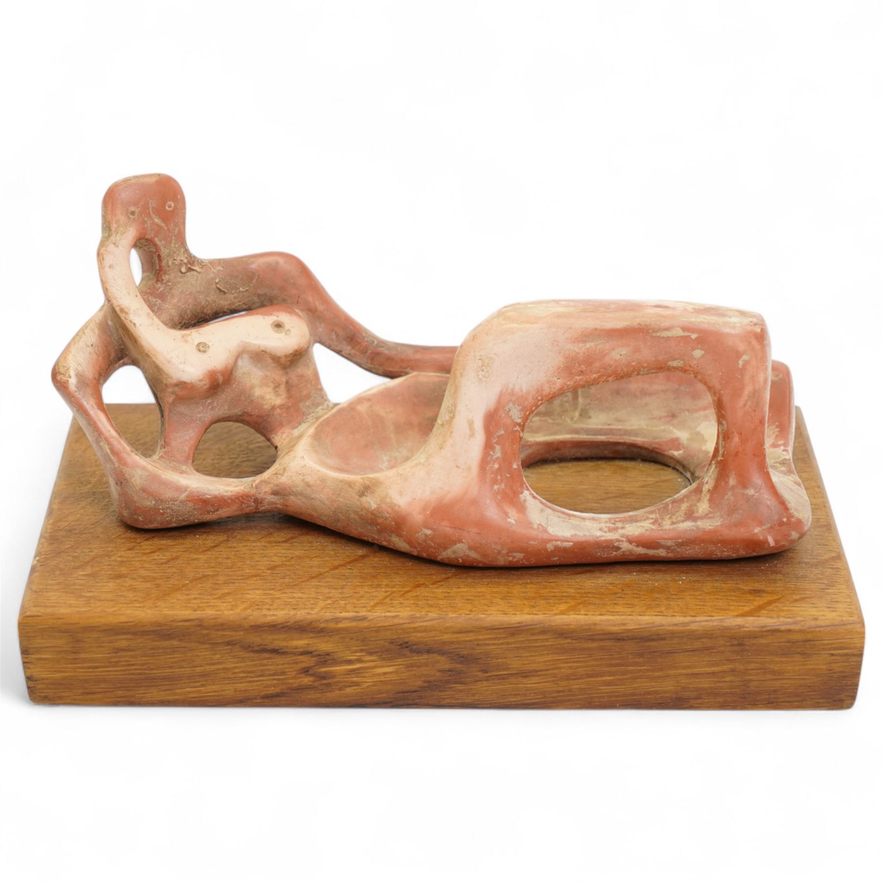 After Henry Moore (British 1898-1986): 'Reclining Figure', terracotta maquette sculpture, base marked with affixed catalogue label inscribed 'Reclining Figure: 1945 Archive 0048398', W19cm H9.5cm
