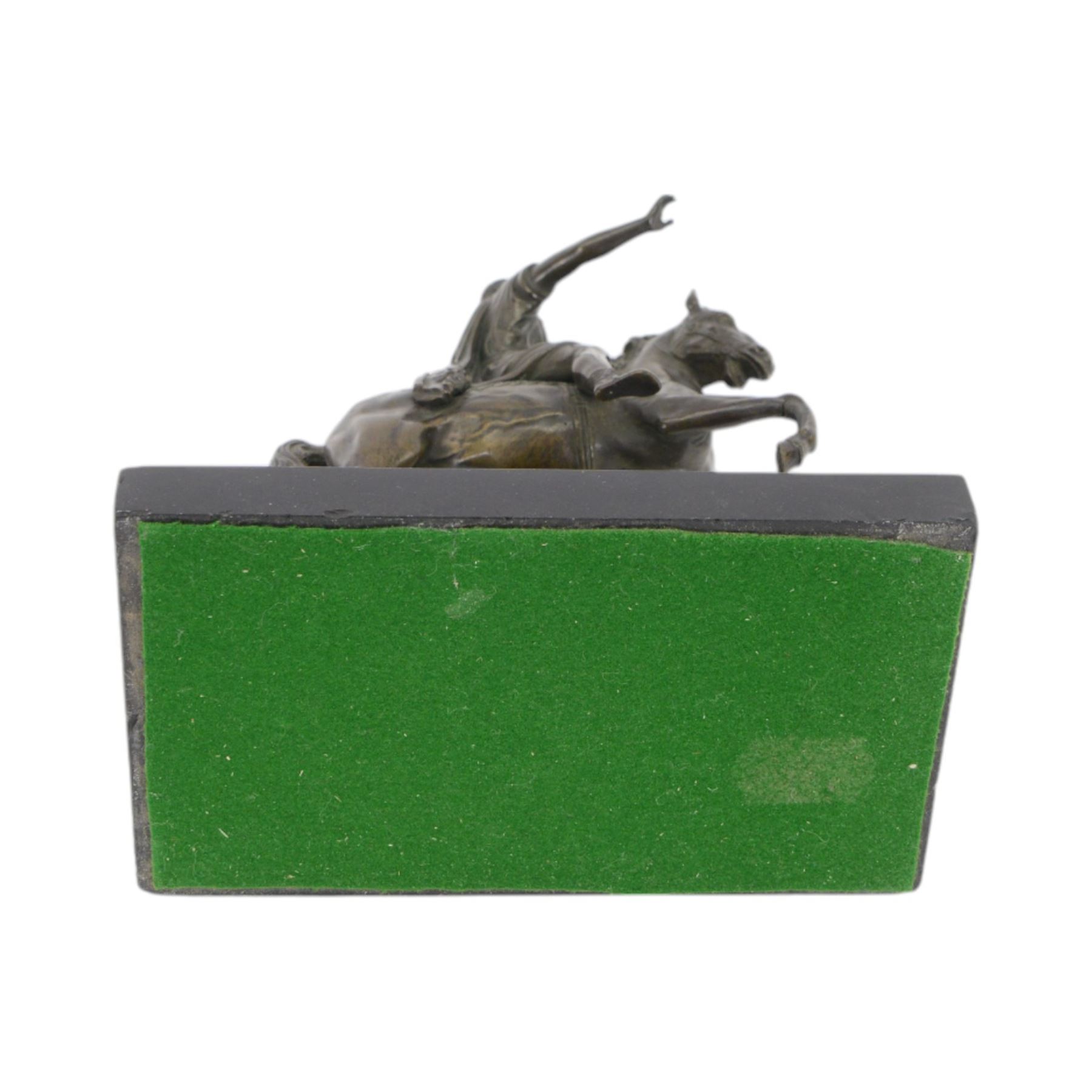 After the antique, bronzed figure of Marcus Aurelius upon horseback, on a rectangular stone base, H22cm   