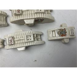 Twelve crested china models of WW1 tanks by Grafton, Arcadian and Carlton china etc with crests from Caistor Lincs, Saffron Walden, Paignton, Evesham etc  , together with a crested china model of the R.M.S Lusitania with New Brighton crest and a two-handled vase for 'The Forts Boxhill' (14)